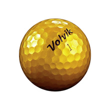 Yellow golf ball with 'Volvik' branding on a white background