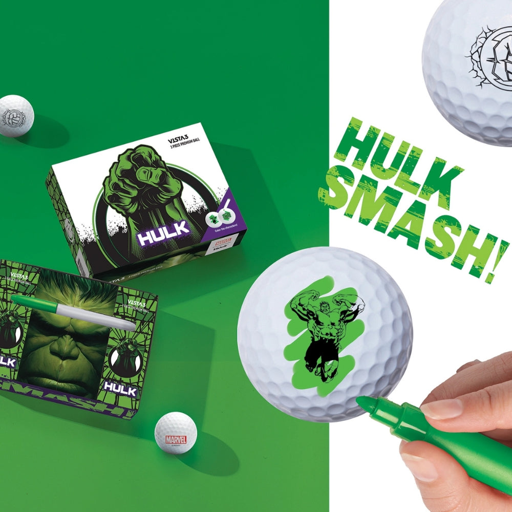 A set of golf balls with the Hulk design, including a box with Hulk imagery and a green marker.