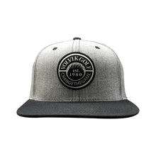 Gray and black cap with Volvik Golf logo on a white background