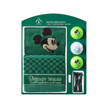 Disney Mickey Mouse Golf Ball Towel Gift Set in a dark green retail package, containing a green towel with a Mickey Mouse face, a checkered green towel, three golf balls (two green with Mickey logos, one white with a Mickey head), and black tees.