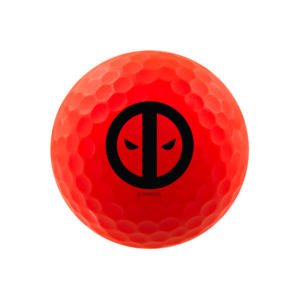 Red golf ball with a black Deadpool logo on a white background
