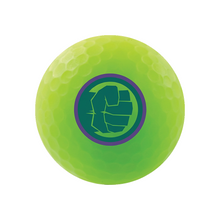 A bright neon yellow-green golf ball with a green and purple graphic of Hulk's fist printed in the center, isolated on a white background.