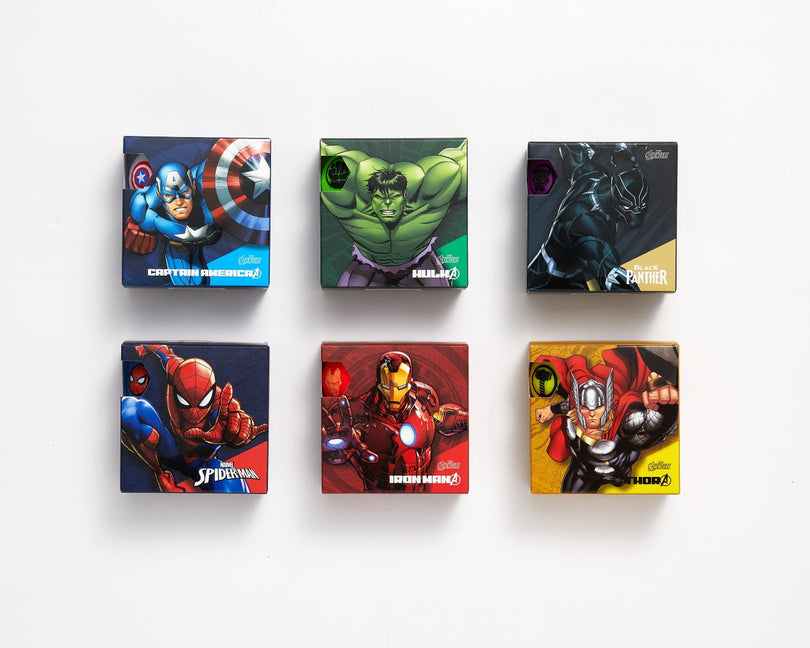 Six Marvel-themed Avengers character golf ball packs arranged in two rows on a white background