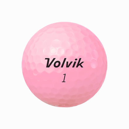 Pink golf ball with 'Volvik' branding on a white background