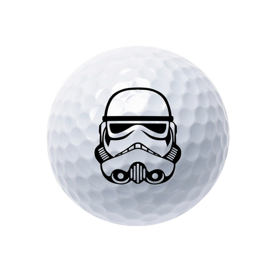 A white golf ball with a black Stormtrooper helmet graphic printed on the front, isolated on a white background.