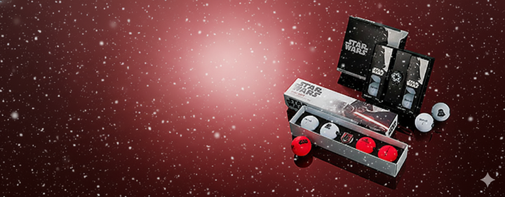 Star Wars-themed golf ball set with packaging and on a red background