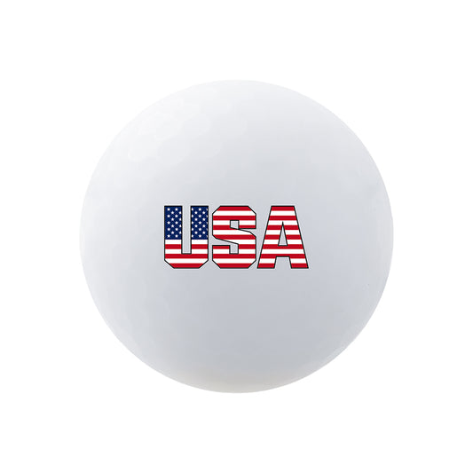 White golf ball with USA text and American flag design on a white background