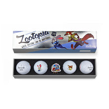 Set of golf balls with Zootopia-themed packaging on a white background