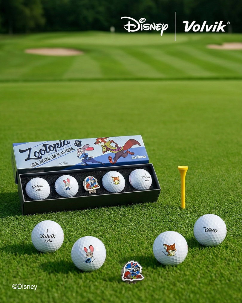 Golf balls with Volvik branding on a grassy field, featuring Zootopia characters in collaboration with Disney.